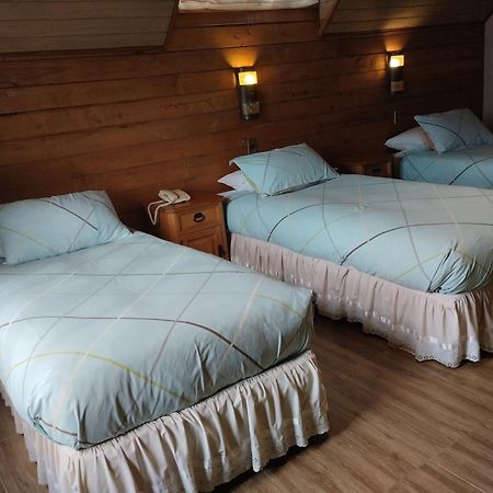 Hotel Malalhue Пукон Экстерьер фото