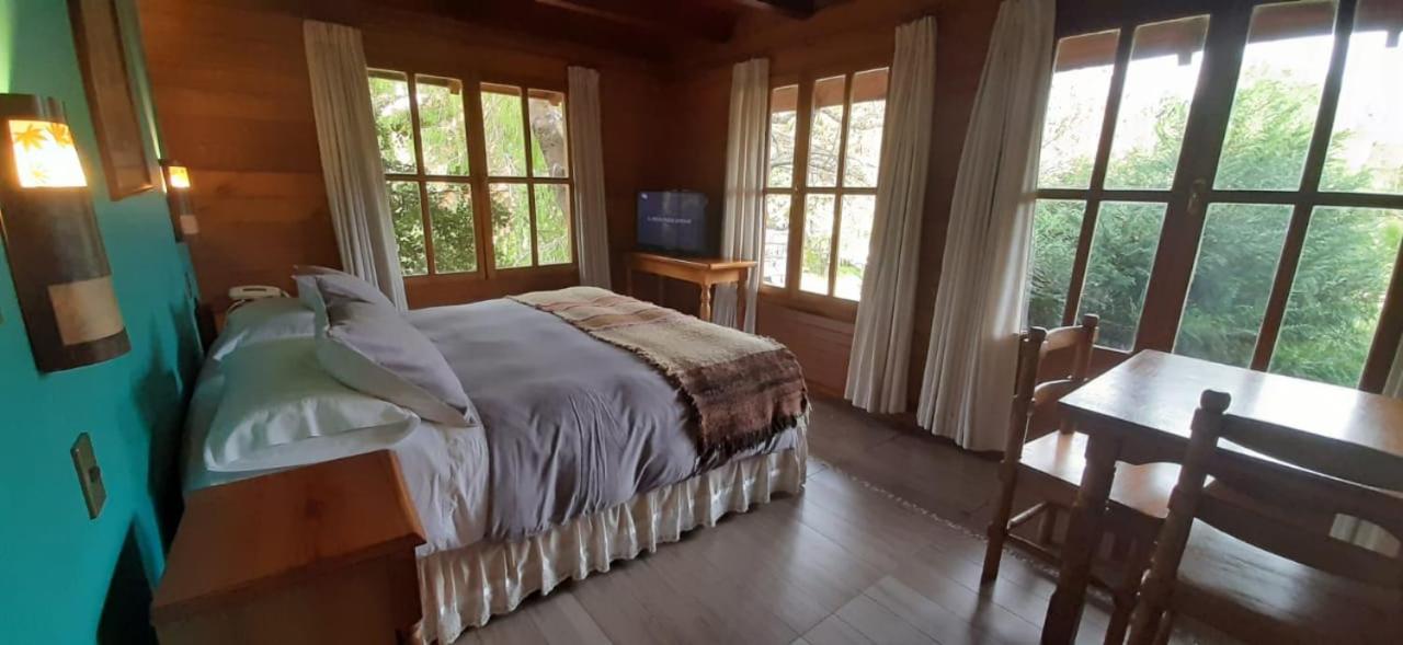 Hotel Malalhue Пукон Экстерьер фото