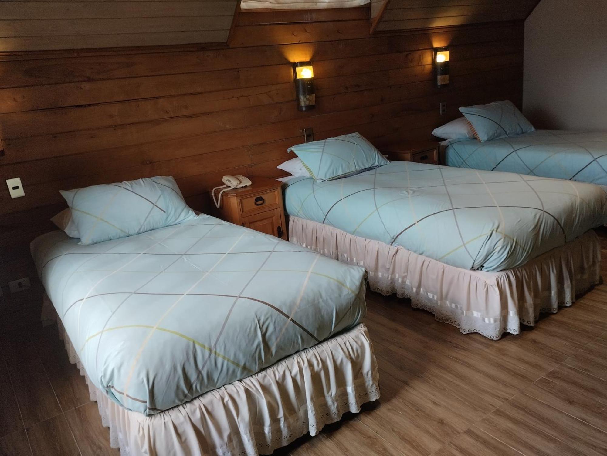 Hotel Malalhue Пукон Экстерьер фото