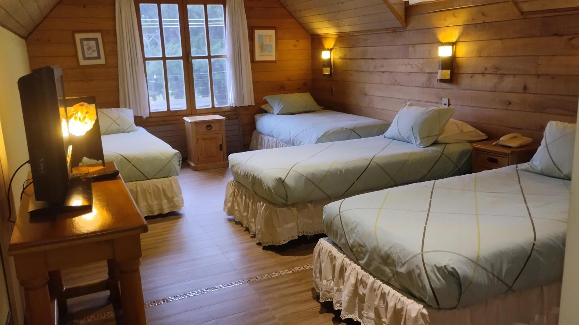 Hotel Malalhue Пукон Экстерьер фото