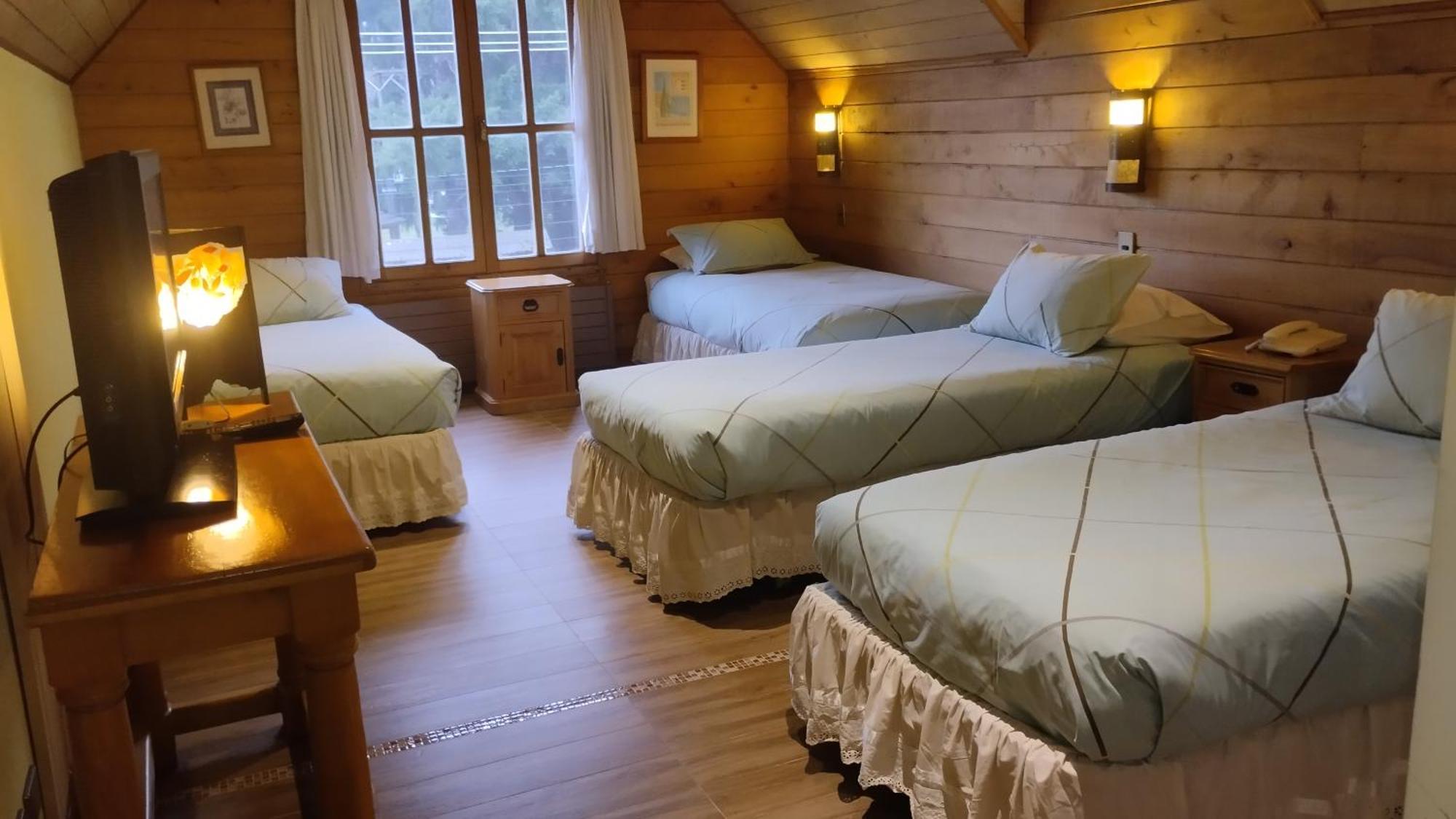Hotel Malalhue Пукон Экстерьер фото