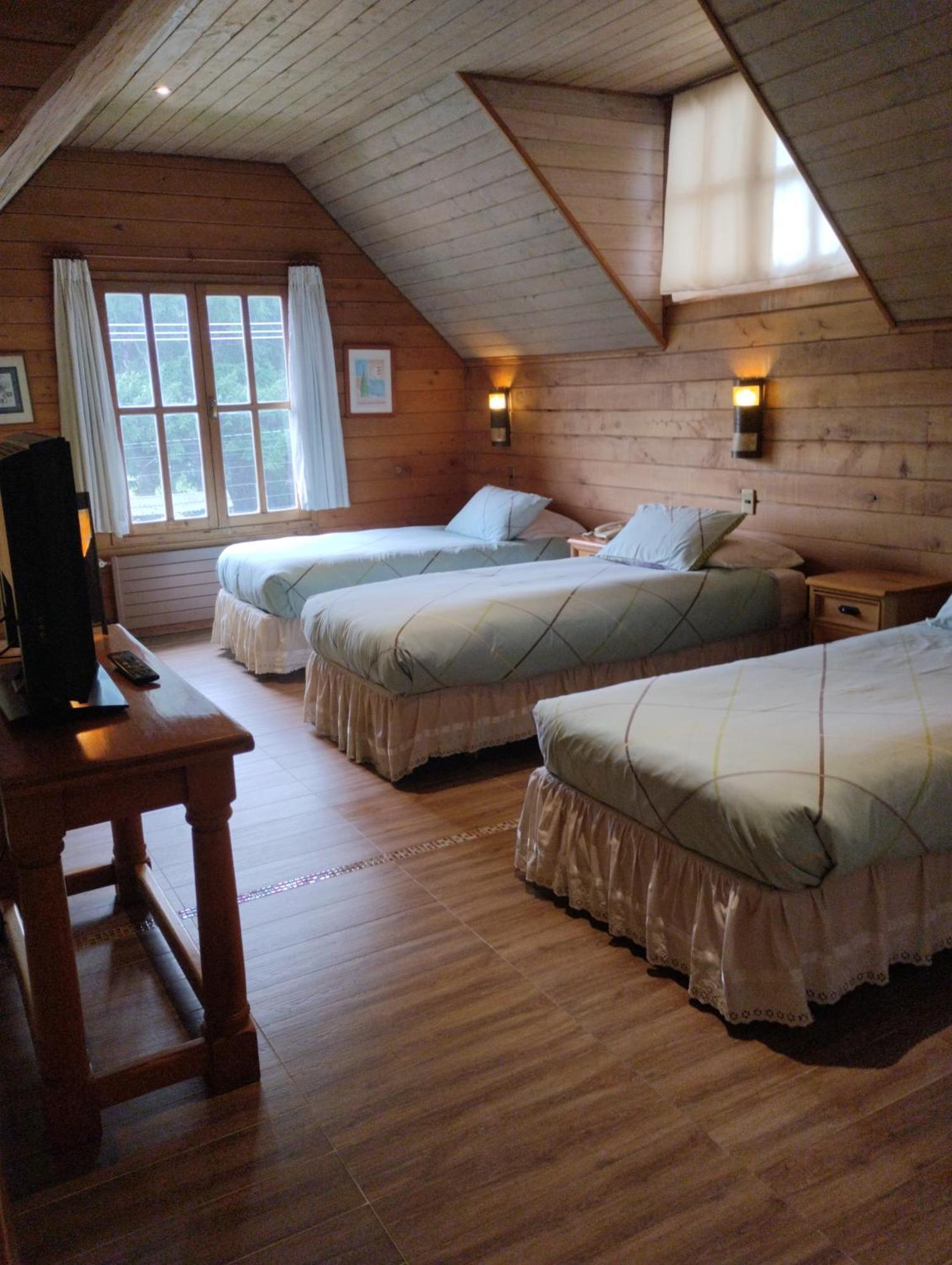Hotel Malalhue Пукон Экстерьер фото
