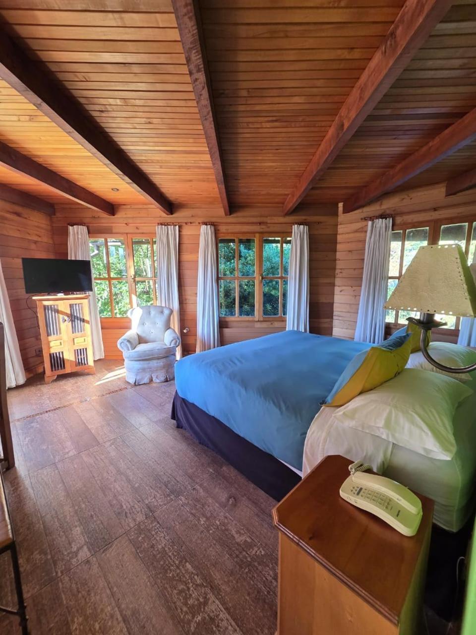 Hotel Malalhue Пукон Экстерьер фото