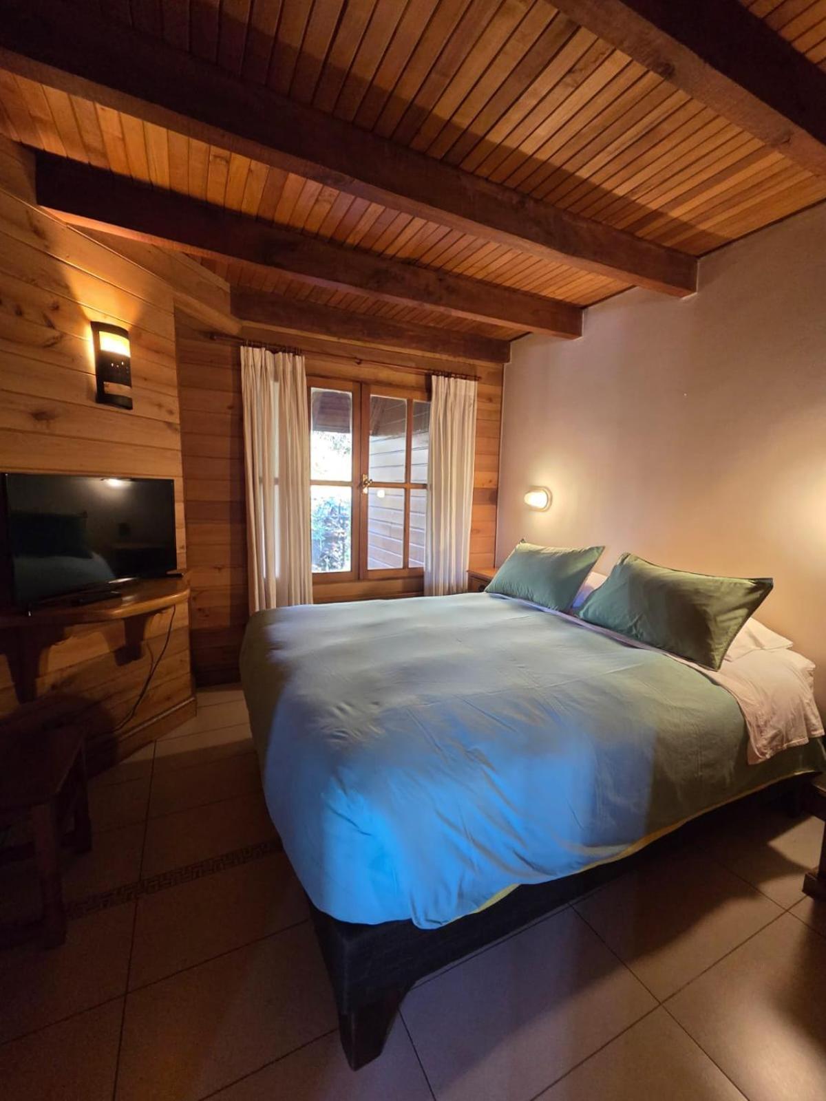 Hotel Malalhue Пукон Экстерьер фото
