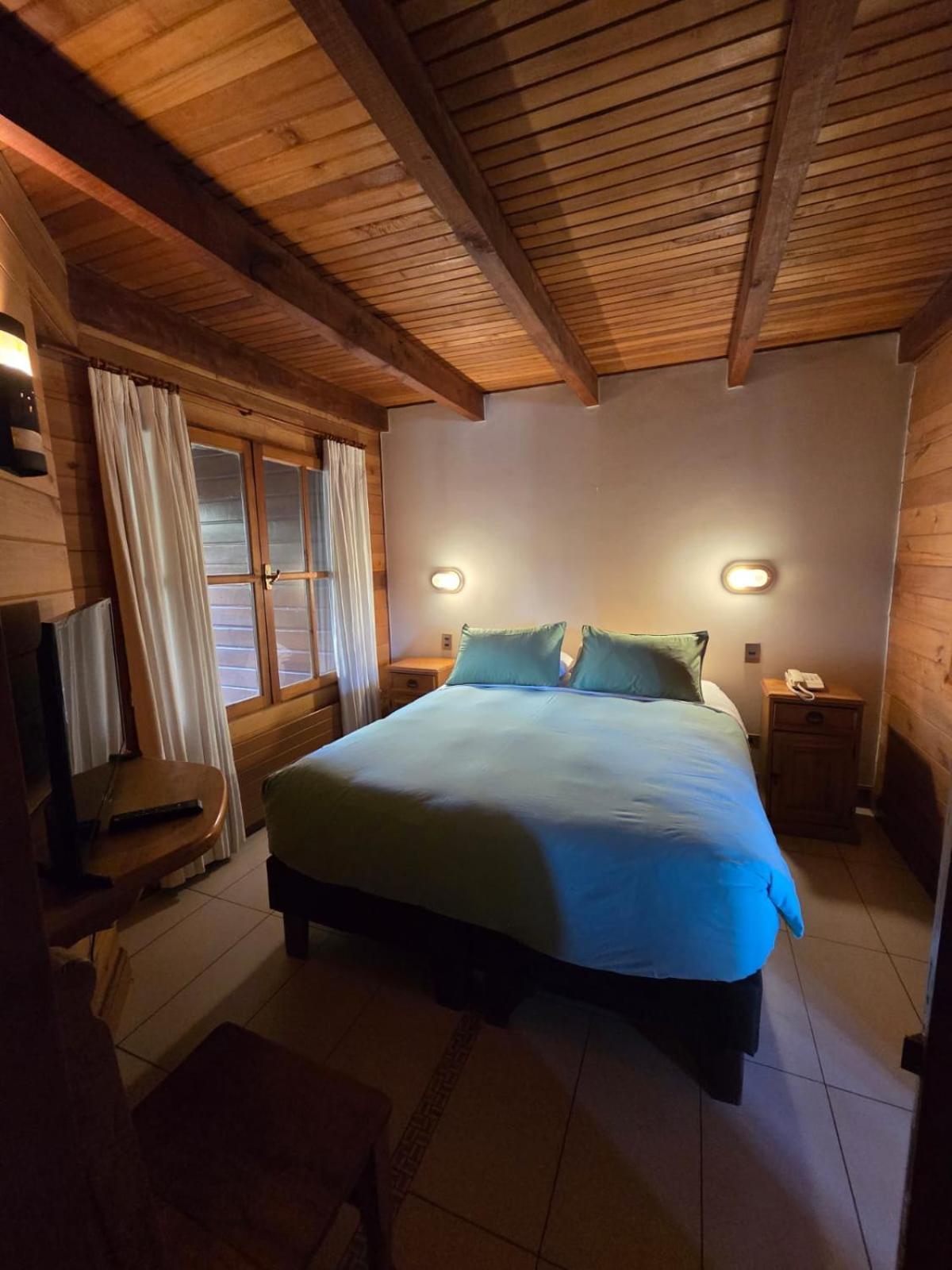 Hotel Malalhue Пукон Экстерьер фото