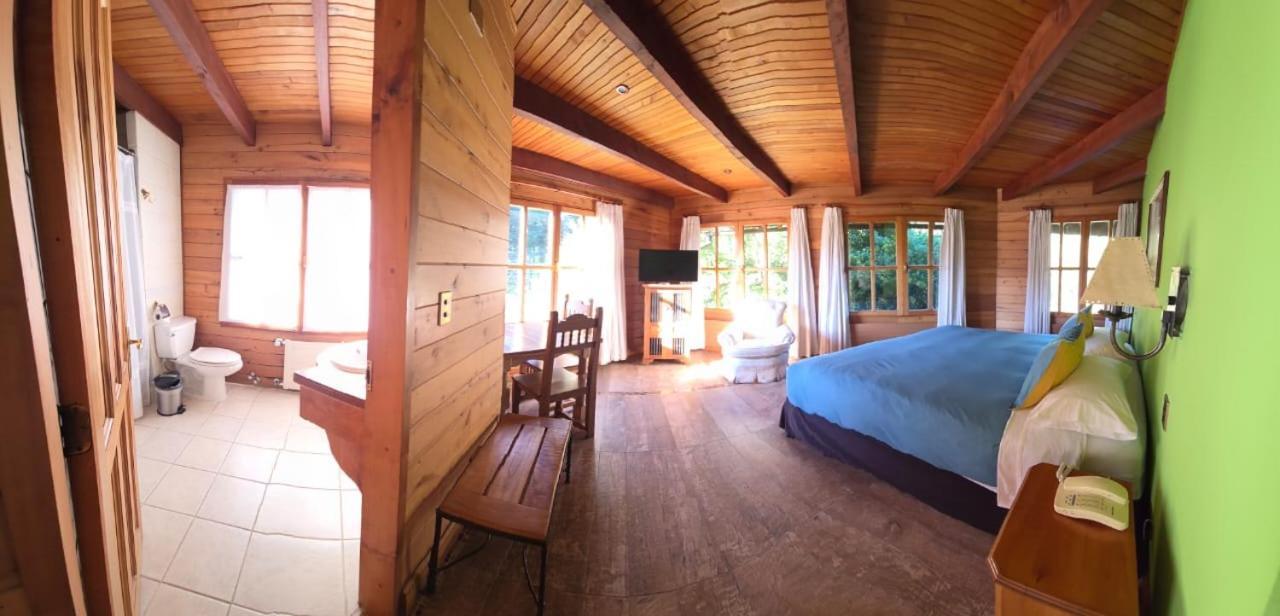 Hotel Malalhue Пукон Экстерьер фото