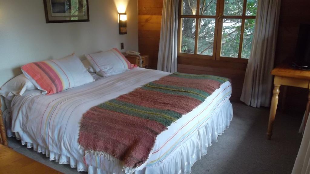 Hotel Malalhue Пукон Экстерьер фото