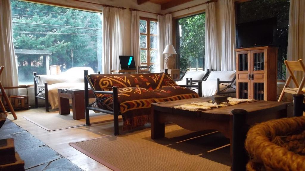 Hotel Malalhue Пукон Экстерьер фото