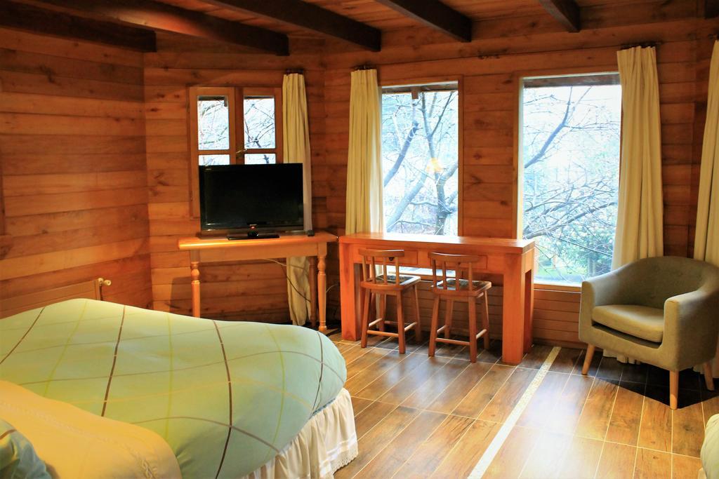 Hotel Malalhue Пукон Экстерьер фото