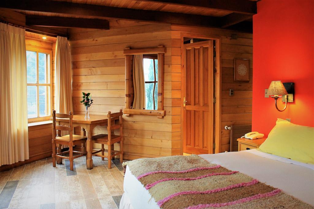 Hotel Malalhue Пукон Экстерьер фото