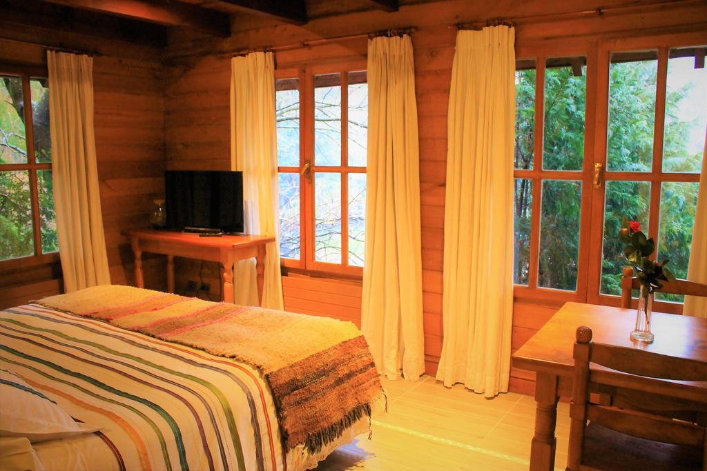 Hotel Malalhue Пукон Экстерьер фото